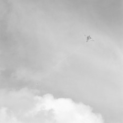<em>Untitled Kite No. 5</em>, 1996, gelatin silver print, 4" x 4" and 40" x 40"